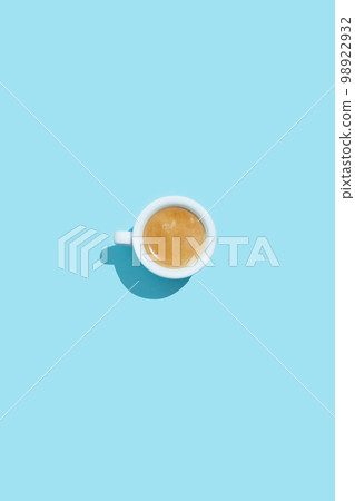 Espresso cup on blue background Espresso cup on blue background 98922932