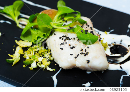 Closeup of French-style stewed merluccius 98925103