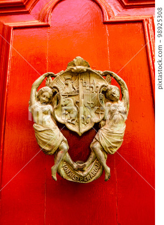 Traditional old antient Maltese door knob in Mdina city on Malta Traditional old antient Maltese door knob in Mdina city on Malta 98925308