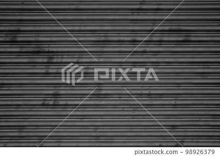 Rusted shutter background a-1-4 dark monochrome Rusted shutter background a-1-4 dark monochrome 98926379