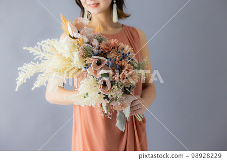 Woman with a bouquet 98928229