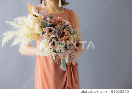 Woman with a bouquet 98928230