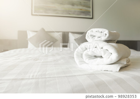 The White towel on bed decoration in bedroom interior - Vintage light Filter 98928353