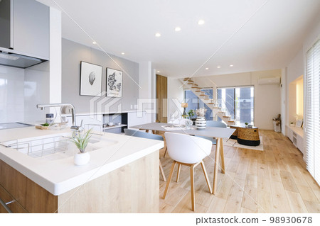 Living room and kitchen in new house 98930678