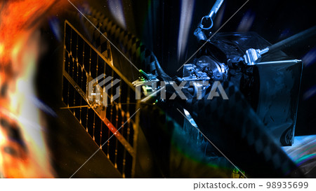 Space probe is flying towards the sun. Space exploration concept. Elements of this image furnished by NASA. 98935699