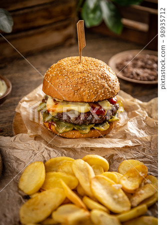 Delicious juicy hamburger 98935712