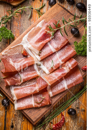 Slices of prosciutto Slices of prosciutto 98936449