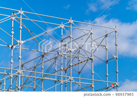 Construction site wedge scaffolding vike blue sky 98937965