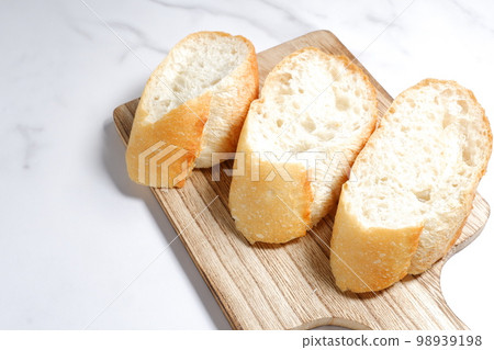 Freshly baked delicious baguette 98939198