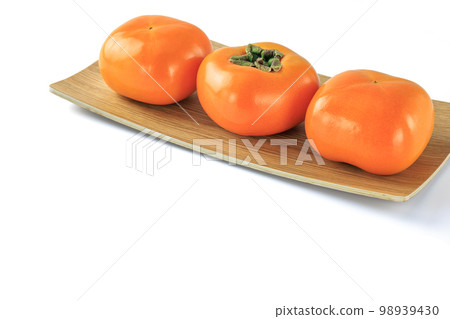 Autumn taste persimmon fruit 98939430