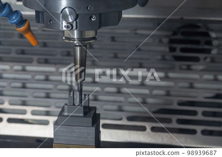 The CNC milling machine finish cutting the graphite electrode parts with solid ball end mill. The CNC milling machine finish cutting the graphite electrode parts with solid ball end mill. 98939687