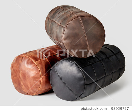 Three comfortable leather bolster cushions in different colors Three comfortable leather bolster cushions in different colors 98939757