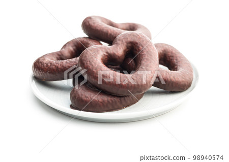 Sweet chocolate hearts isolated on white background. 98940574