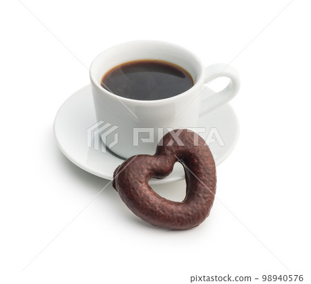 Sweet chocolate hearts and coffee cup isolated on white background. Sweet chocolate hearts and coffee cup isolated on white background. 98940576