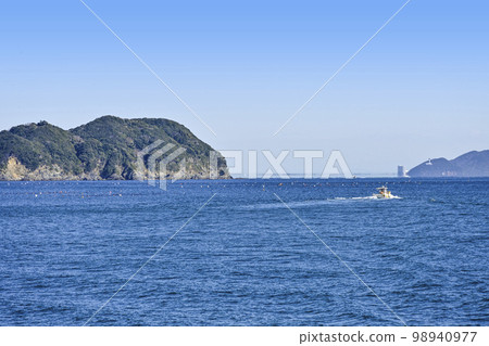 A view of Toshijima and the Chita Peninsula from a ship in transit A view of Toshijima and the Chita Peninsula from a ship in transit 98940977