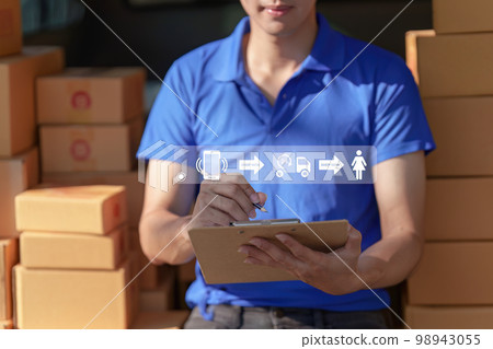 Asian courier with parcel and delivery logistic concept. Delivery man with checking list on clipboard Asian courier with parcel and delivery logistic concept. Delivery man with checking list on clipboard 98943055