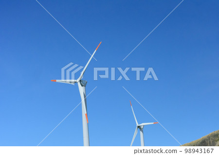 wind turbines on a hill 98943167