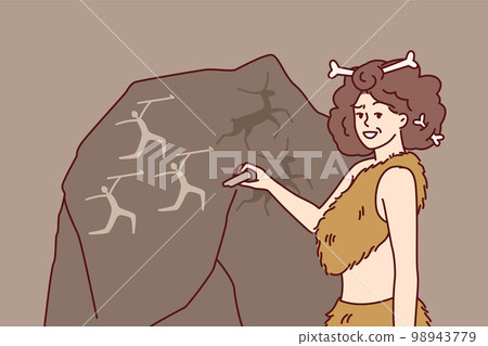 Ancient woman in clothing from animal skins and bones in hair makes rock paintings 98943779