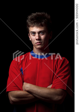 Soccer player whit arms crossed 98944000