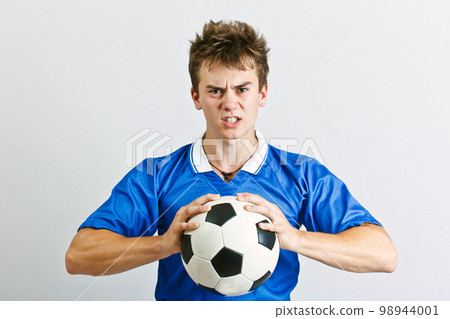 Angry soccer player 98944001