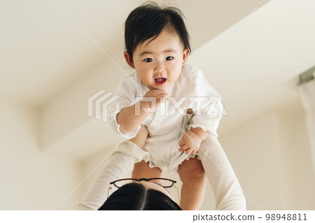 Cuddled baby Cuddled baby 98948811