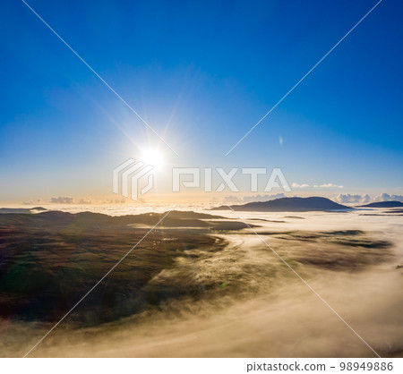 Donegal covered with fog from Crove upper to Teelin - Ireland 98949886