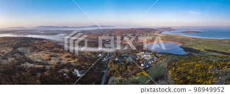 Aerial view of Clooney Lake in Narin and Portnoo, County Donegal - Ireland Aerial view of Clooney Lake in Narin and Portnoo, County Donegal - Ireland 98949952