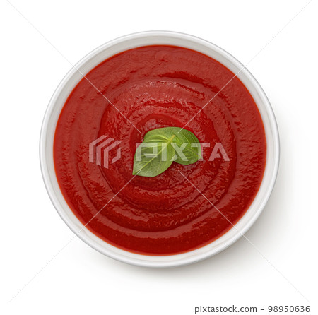 Bowl of tomato soup isolated on white background, top view Bowl of tomato soup isolated on white background, top view 98950636