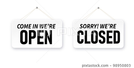 Information boards with Come in we're open and Sorry, We are closed. White signboard with a rope on background. Business concept for closed and open businesses, sites and services 98950803