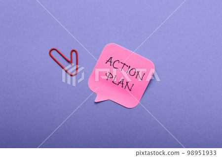 Sticker with text Action Plan and paper clip on purple 98951933