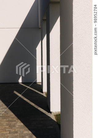 Shadow on the white wall. Textures. Black and white 98952784