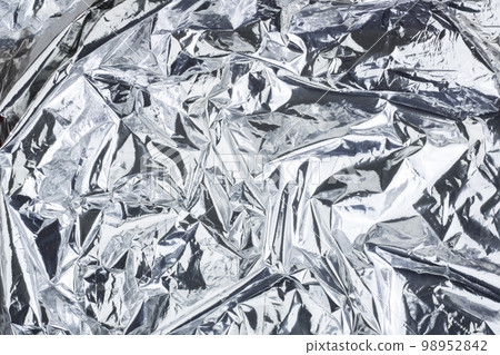 Silver gray crumpled background, metallic. Texture gray silver metallic background. Blank blank mockup. Copy space Silver gray crumpled background, metallic. Texture gray silver metallic background. Blank blank mockup. Copy space 98952842