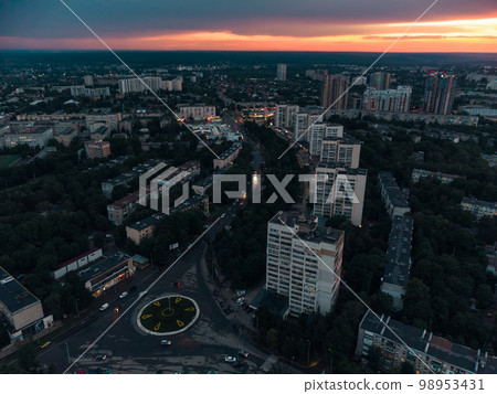 Epic aerial sunset in city residential district 98953431