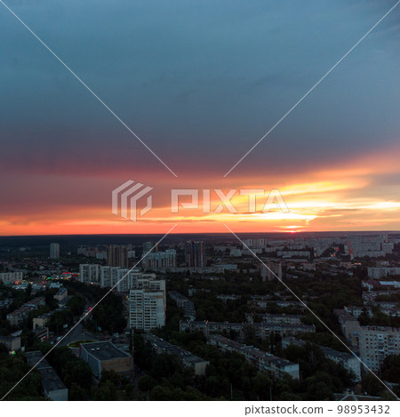 Epic aerial sunset in city residential district Epic aerial sunset in city residential district 98953432