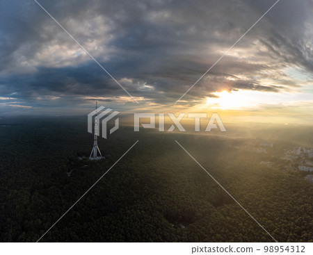 Aerial sunrise epic city view with telecom tower Aerial sunrise epic city view with telecom tower 98954312