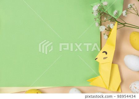 Happy Easter - layout with space for text, Easter bunny made of origami paper, top view 98954434
