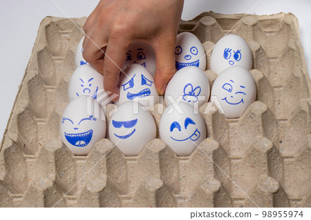 Funny chicken eggs. Smiley eggs with faces, funny faces. Eggs with different emotions Funny chicken eggs. Smiley eggs with faces, funny faces. Eggs with different emotions 98955974