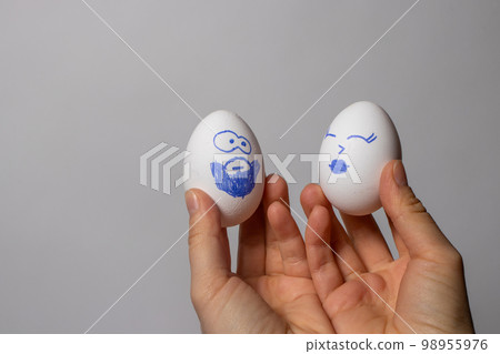 Funny chicken eggs. Smiley eggs with faces, funny faces. Eggs with different emotions 98955976