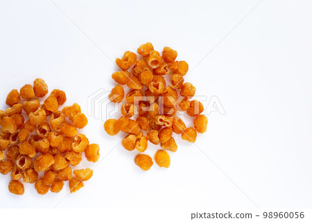 Dried longan on white background. 98960056