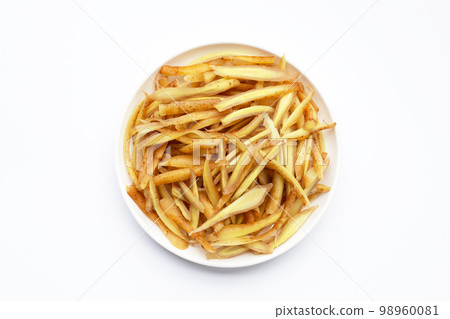 Sliced finger root on white background. 98960081