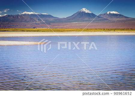 Licancabur with reflection lake and volcanic landscape at Sunset, Atacama, Chile 98961652