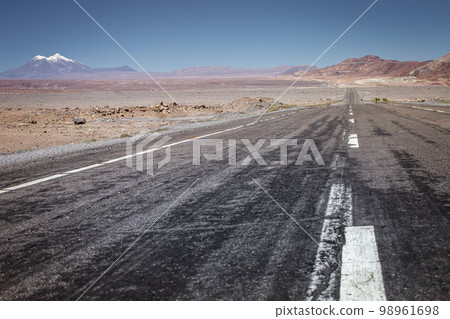 Road in Moon Valley dramatic landscape at Sunset, Atacama Desert, Chile 98961698