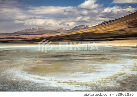 Salt lake, volcanic landscape at Sunset, Atacama, Chile border with Bolivia 98961886