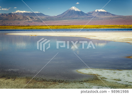 Licancabur with reflection lake and volcanic landscape at Sunset, Atacama, Chile 98961986