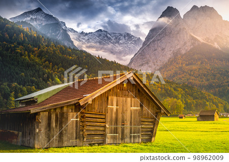 Bavarian alps and rustic farm barn, Garmisch, Zugspitze massif, Bavaria, Germany Bavarian alps and rustic farm barn, Garmisch, Zugspitze massif, Bavaria, Germany 98962009