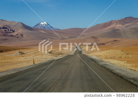 Road in Moon Valley dramatic landscape at Sunset, Atacama Desert, Chile Road in Moon Valley dramatic landscape at Sunset, Atacama Desert, Chile 98962228
