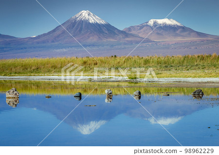 Licancabur with reflection lake and volcanic landscape at Sunset, Atacama, Chile 98962229