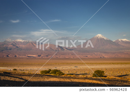 Licancabur and dramatic volcanic landscape at Sunset, Atacama Desert, Chile 98962428