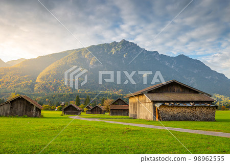 Bavarian alps and rustic farm barn, Garmisch, Zugspitze massif, Bavaria, Germany Bavarian alps and rustic farm barn, Garmisch, Zugspitze massif, Bavaria, Germany 98962555