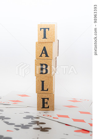 Playing cards and wooden blocks TABLE 98963393